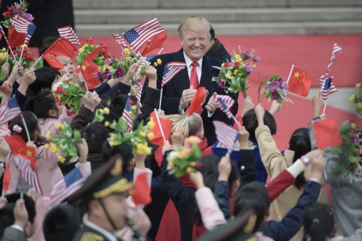 Donald Trump was treated to a lavish welcome ceremony at Beijing's Great Hall of the People (AFP Photo/FRED DUFOUR)