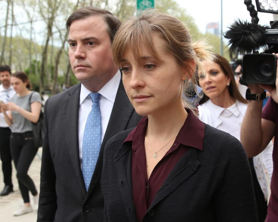 <div class="inline-image__caption"><p>Actress Allison Mack departs the United States Eastern District Court after a bail hearing in relation to the sex trafficking charges filed against her on May 4, 2018, in the Brooklyn borough of New York City.</p></div> <div class="inline-image__credit">Jemal Countess/Getty</div>