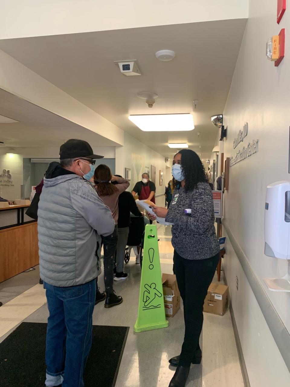 Residents in Ukiah line up for a COVID-19 vaccine after a freezer storing it broke down.