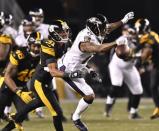 Dec 25, 2016; Pittsburgh, PA, USA; Baltimore Ravens wide receiver Mike Wallace (17) has a pass broken up by Pittsburgh Steelers cornerback Ross Cockrell (31) during the second quarter of a game at Heinz Field. Mandatory Credit: Mark Konezny-USA TODAY Sports