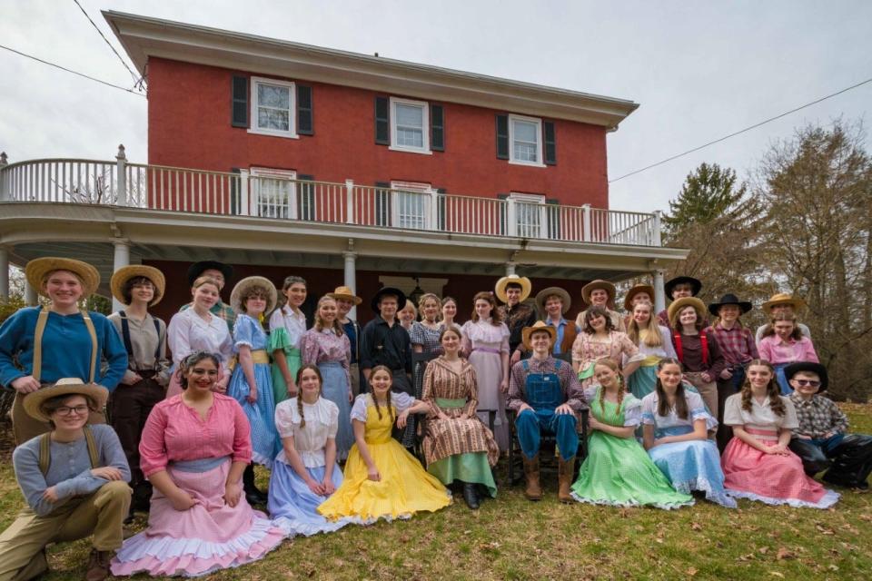 The cast of the Central Bucks High School East production of "Oklahoma' visit Highland Farm in Doylestown Township where Oscar Hammerstein II wrote the lyrics for the famous musical.