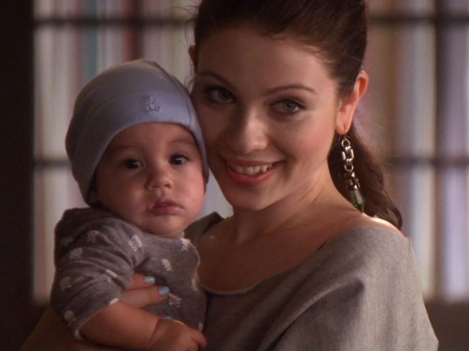 georgina holding a baby on an episode of gossip girl