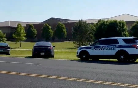 Police is seen near Noblesville West Middle School in Noblesville, Indiana, U.S., May 25, 2018 in this still image obtained from social media video. COURTESY CHRISTOPHER REILY/via REUTERS