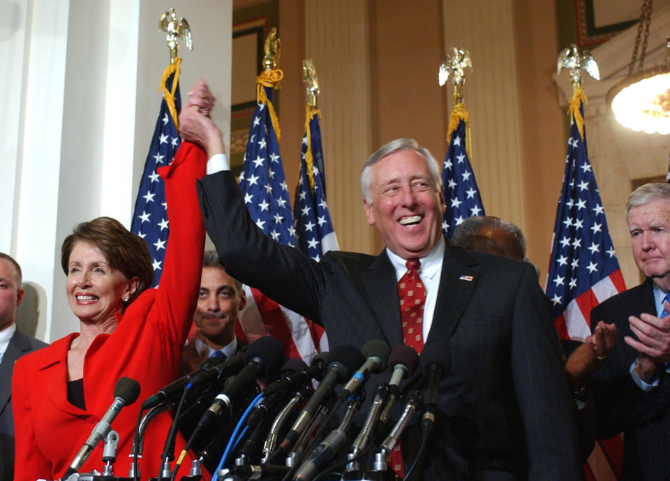 Incoming House Speaker Nancy Pelosi of Calif., and incoming House Majority Leader Steny Hoyer of Md., join hands during a news conference on Capitol Hill in Washington, Thursday, Nov. 16, 2006, after Pelosi and Hoyer were elected to their positions when the 110th Congress starts in January. (Photo: Dennis Cook/AP)