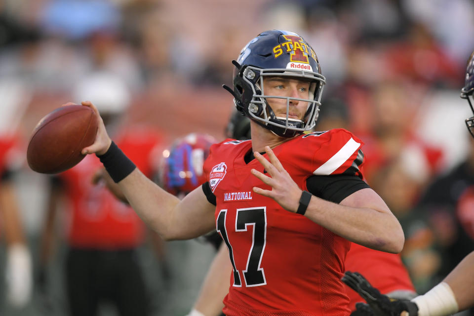 National Team quarterback Reid Sinnett, of San Diego, looks for a receiver during the first half of the Collegiate Bowl college football game against the American Team on Saturday, Jan. 18, 2020, in Pasadena, Calif. (AP Photo/Mark J. Terrill)