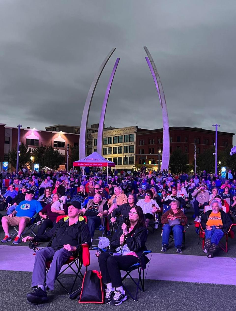 People packed Centennial Plaza on Friday night during a ZYGRT concert as part of the Downtown Canton Music Fest. ZYGRT is a tribute band that plays Led Zeppelin, Yes, Genesis, Rush and Toto songs.