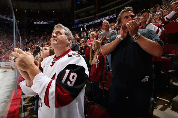 GLENDALE, AZ - OCTOBER 15: Fans cheer during the NHL game between the Arizona Coyotes and the Philadelphia Flyers at Gila River Arena on October 15, 2016 in Glendale, Arizona. The Coyotes defeated the Flyers 4-3 in overtime. (Photo by Christian Petersen/Getty Images)