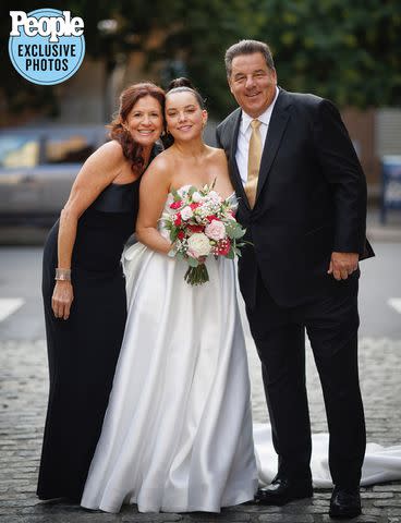 <p>Alfonso Lozano</p> Steve and Laura Schirripa pose with their daughter Ciara at her wedding.
