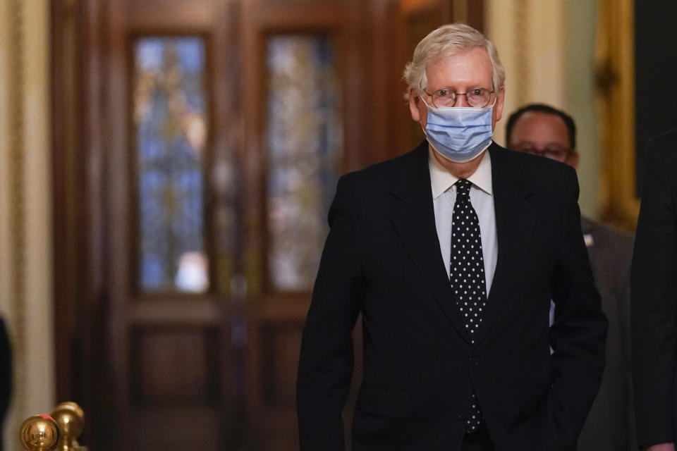 Senate Majority Leader Mitch McConnell of Ky., walks from the Senate floor to his office on Capitol Hill Wednesday, Jan. 6, 2021, in Washington. (AP Photo/Manuel Balce Ceneta)