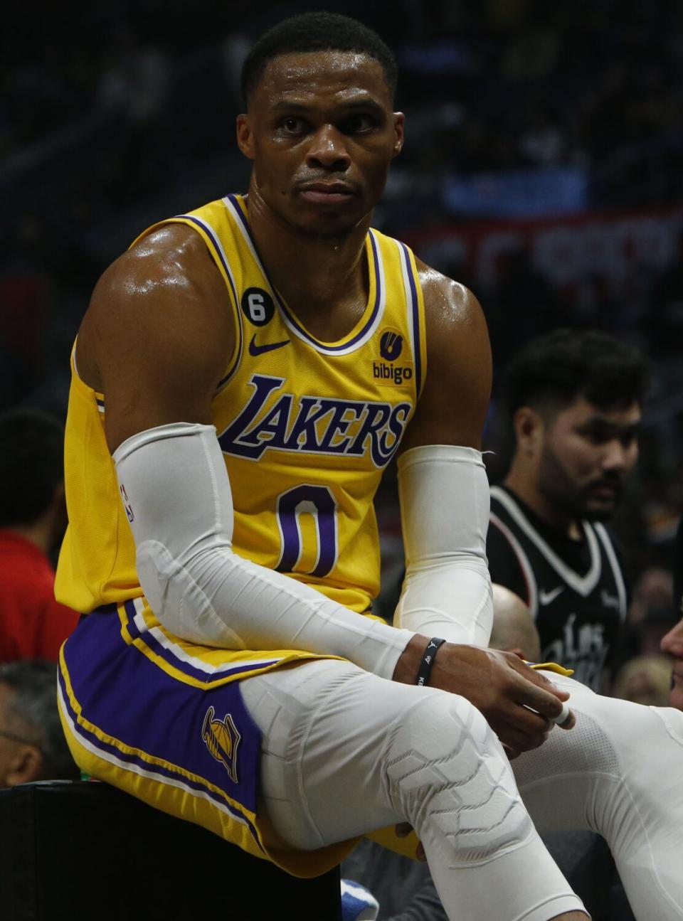 Russell Westbrook sits on the scorer's table during a timeout against the Clippers on Nov. 9.