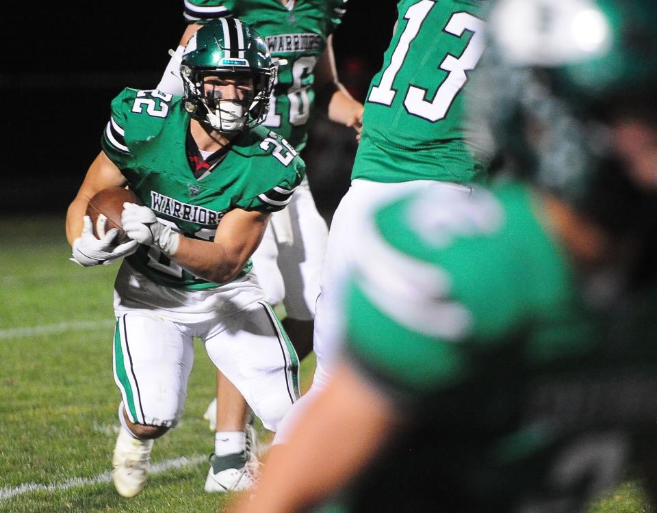 West Branch's Boston Mulinix, running the ball against Alliance earlier this season, scored three TDs Friday.