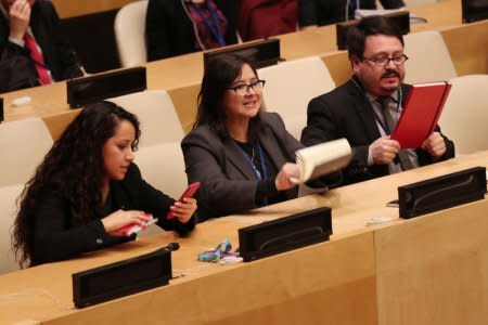 Cuban diplomats protest the launch of a U.S. campaign on Cuban political prisoners at the United Nations in New York, U.S., October 16, 2018. REUTERS/Shannon Stapleton