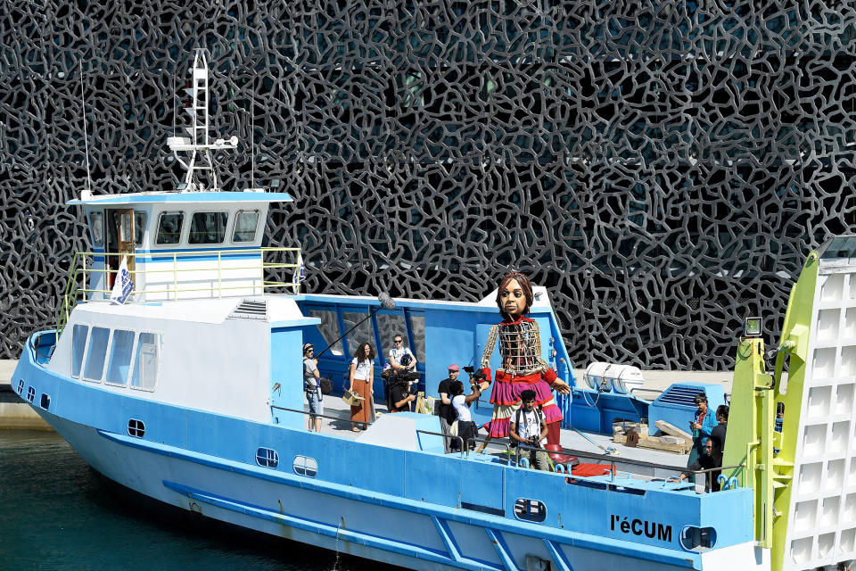 Little Amal arrives by boat in Marseille, France, on Sept. 22, 2021.