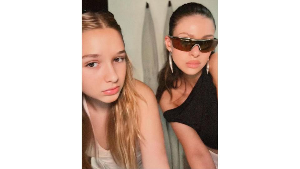 Harper Beckham and Nicola Peltz pouting for the camera