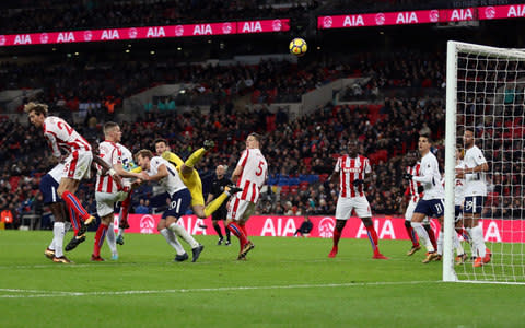 Mark Hughes fighting to save job as Stoke players confronted by angry fans at train station