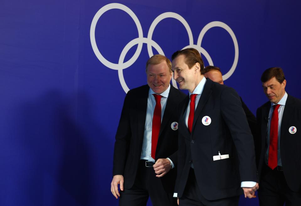 Head coach Alexei Zhamnov and Sergei Fedorov of Team ROC make their way to the bench area the men's Ice Hockey Quarterfinal match between Team ROC and Team Denmark on Day 12 of the Beijing 2022 Winter Olympic Games at Wukesong Sports Centre on Feb. 16, 2022 in Beijing.