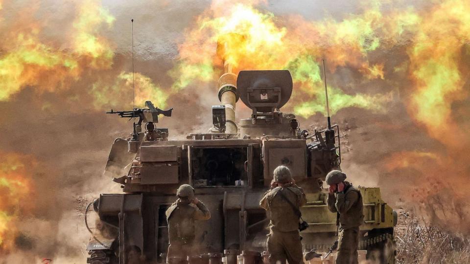 PHOTO: An Israeli army self-propelled howitzer fires rounds near the border with Gaza in southern Israel, Oct. 11, 2023. (Jack Guez/AFP via Getty Images)