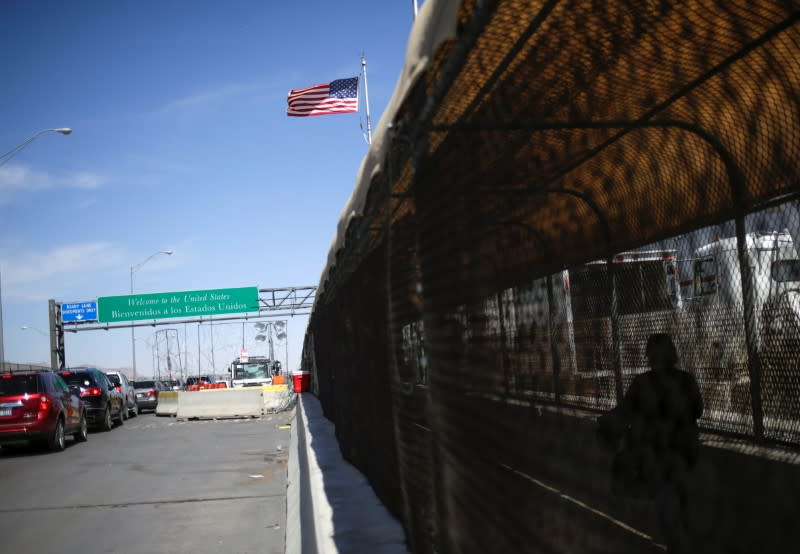 Vehicles wait in line to cross into the U.S, in Ciudad Juarez