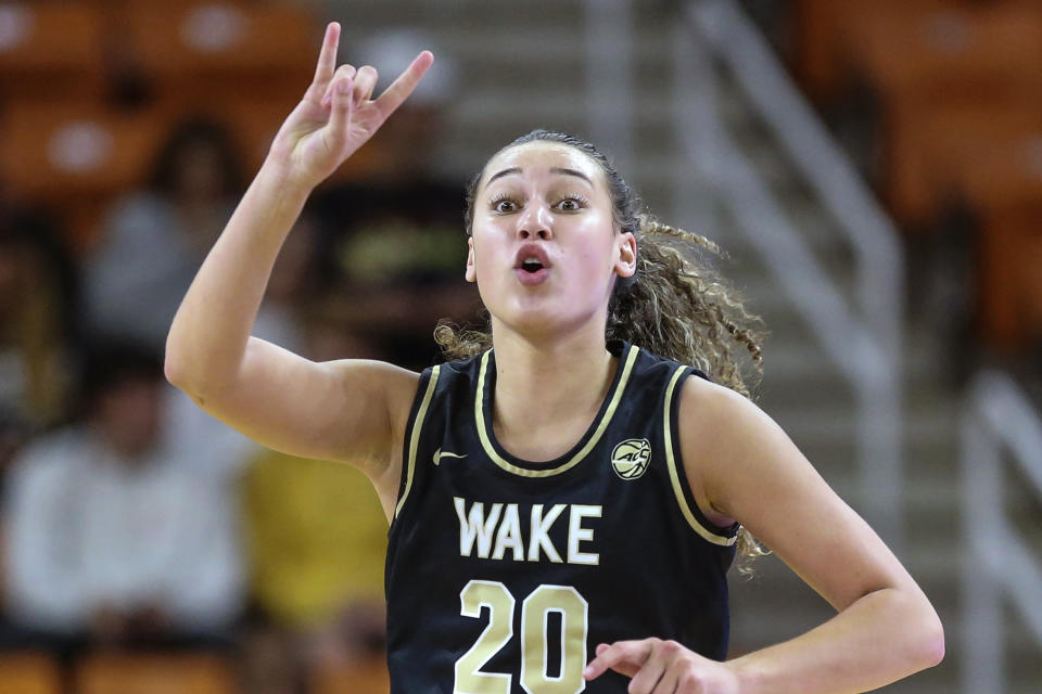 FILE - Wake Forest forward Olivia Summiel (20) gestures during an NCAA college basketball game against Mercer on Tuesday, Nov. 9, 2021, in Macon, Ga. The NCAA is allowing teams to play and practice on election day after making it a mandatory off day the past two years for athletes to participate in civic engagement. “We had these discussions to give athletes the most flexibility as possible,” said Wake Forest basketball player Olivia Summiel., who is on the Student-Athlete Advisory Committee. (AP Photo/Gary McCullough, File)