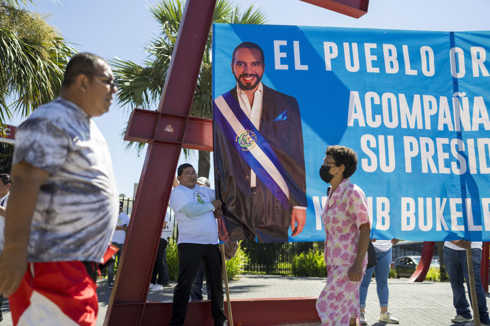 Supporters of El Salvador President Nayib Bukele campaign for his re-election outside a shopping mall in San Salvador, El Salvador, Wednesday, Jan. 31, 2024. El Salvador will hold a presidential election on Feb. 4. (AP Photo/Moises Castillo)