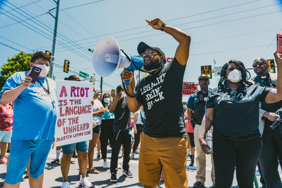 Tulsa activists Greg Robinson and Tiffany Crutcher lead peaceful protests in the wake of George Floyd's death on May 31, 2020. | CreeseWorks—The Black Wall Street Times