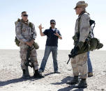 <p>Jake Gyllenhaal, director Sam Mendes and Peter Sarsgaard on the set of Universal Pictures' Jarhead - 2005</p>