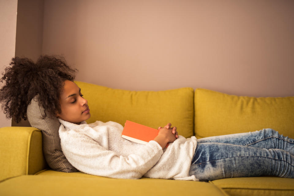 Woman pictured taking a day time nap. (Getty Images)