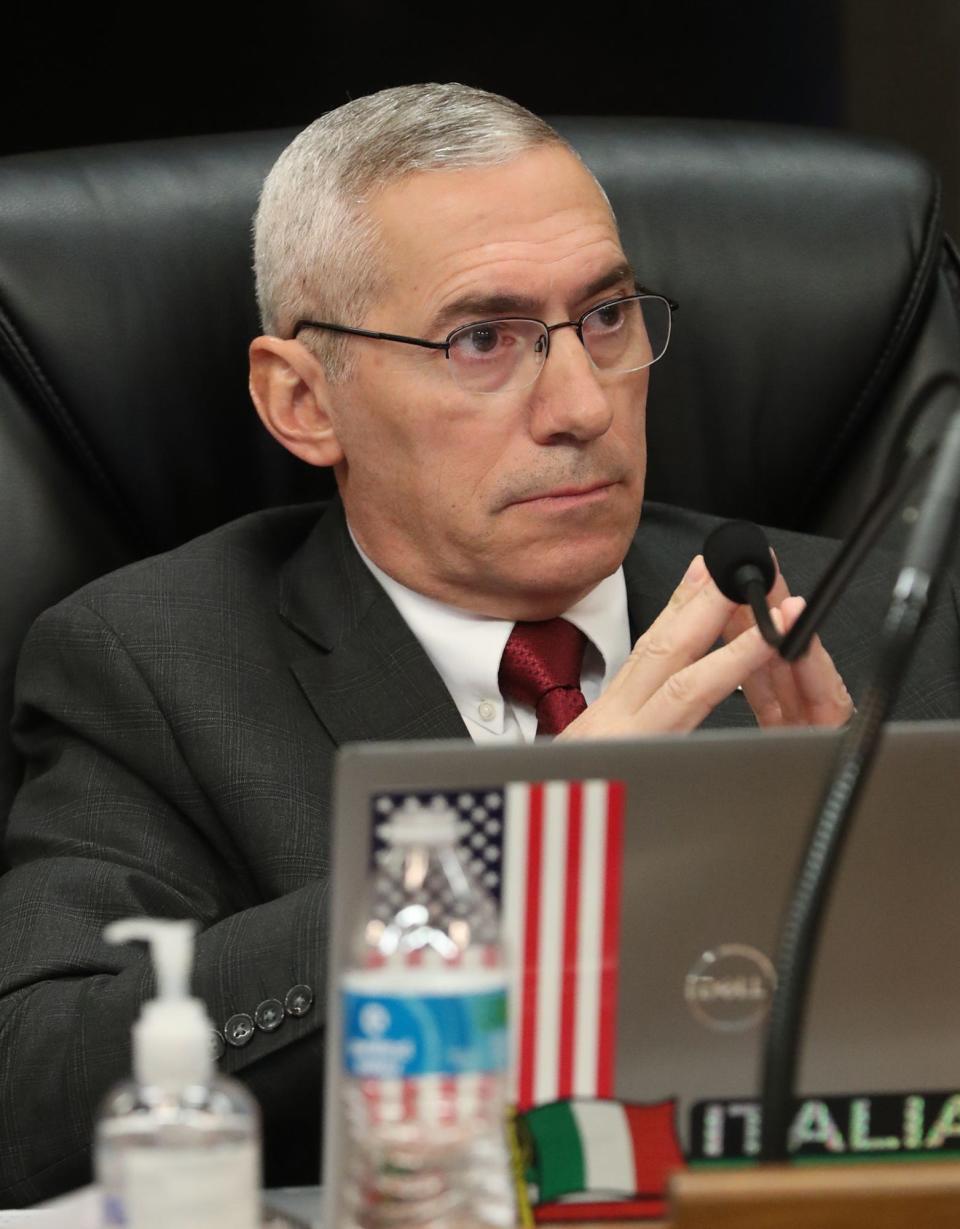 Phil Lombardo, Ward 2 representative, listens during an Akron City Council meeting Monday. City Council failed to seat Imokhai Okolo and five others on the city's new Citizens' Police Oversight Board.