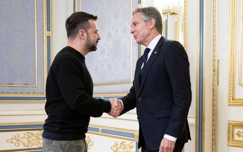 Ukraine's President Volodymyr Zelenskyy, left, greets U.S. Secretary of State Antony Blinken, right, prior to their meeting in Kyiv, Ukraine, Tuesday, May 14, 2024.