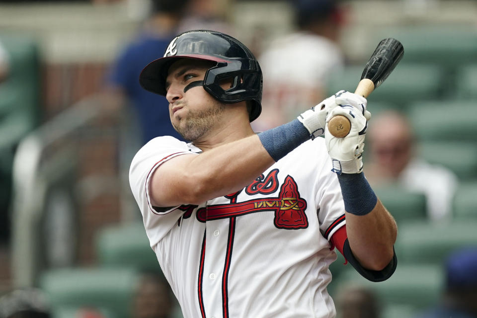 Atlanta Braves' Austin Riley (27) hits a double in the second inning of a baseball game against the Philadelphia Phillies Wednesday, Aug. 3, 2022, in Atlanta. (AP Photo/John Bazemore)