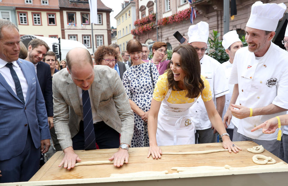 Duke and Duchess of Cambridge make pretzels in Heidelberg Market