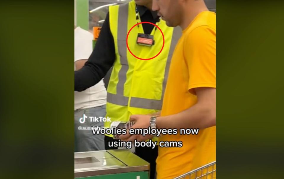 TikTok screenshot showing Woolworths staff member wearing a body camera