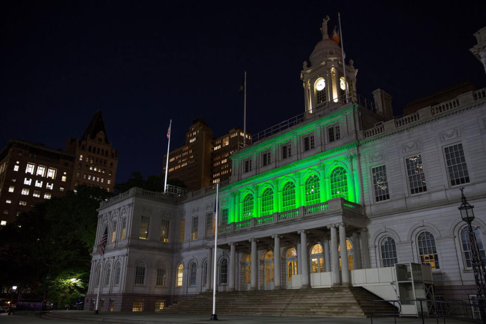 New York City Hall shines green