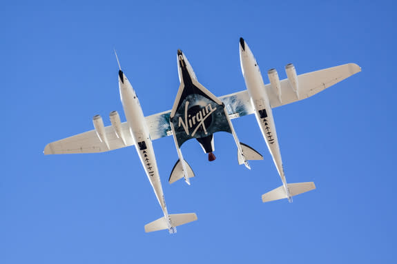 Virgin Galactic's SpaceShipTwo is carried aloft by its mothership, WhiteKnightTwo, on Sept. 5, 2013, for the private space plane's second-ever rocket-powered flight test.