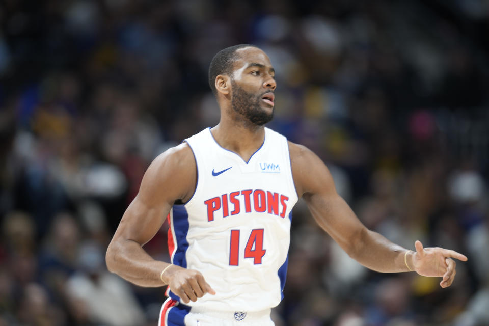 Detroit Pistons guard Alec Burks gestures after hitting a 3-point basket against the Denver Nuggets in the first half of an NBA basketball game Sunday, Jan. 7, 2024, in Denver. (AP Photo/David Zalubowski)