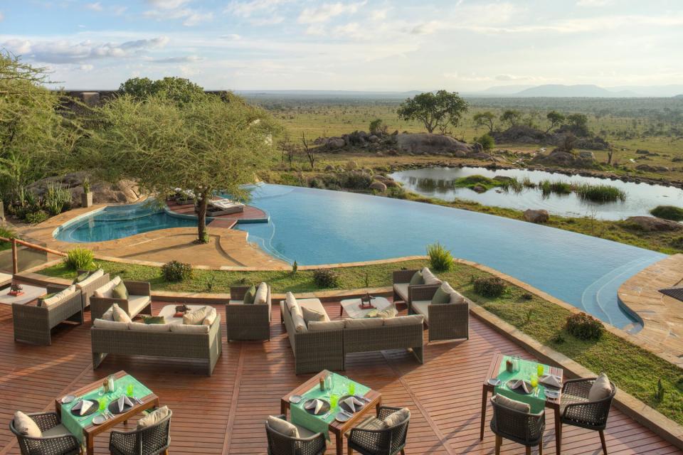 Aerial view of the pool and outdoor dining area at Four Seasons Safari Lodge Serengeti