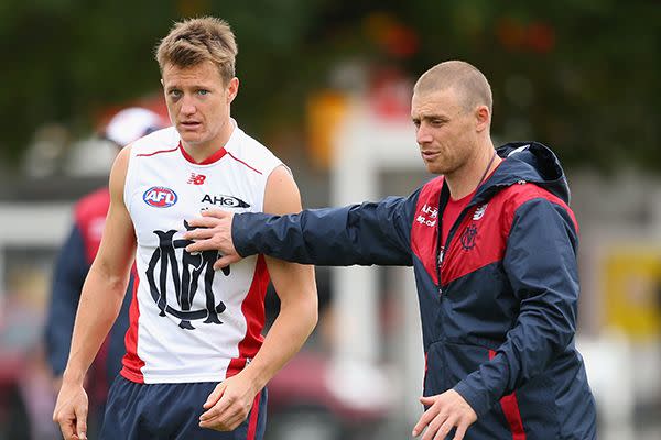 Getty Images: Goodwin instructs Aaron Vandenberg at Demons training.