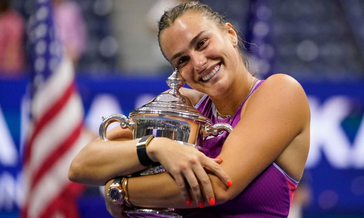 <span>Aryna Sabalenka hugs the US Open trophy.</span><span>Photograph: Timothy A Clary/AFP/Getty Images</span>