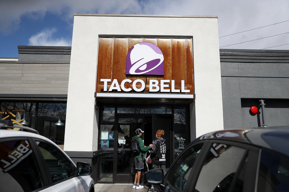 NOVATO, CA - FEBRUARY 22:  Customers enter a Taco Bell restaurant on February 22, 2018 in Novato, California. Taco Bell has become the fourth-largest domestic restaurant brand by edging out Burger King. Taco Bell sits behind the top three restaurant chains McDonald's, Starbucks and Subway.  (Photo by Justin Sullivan/Getty Images)