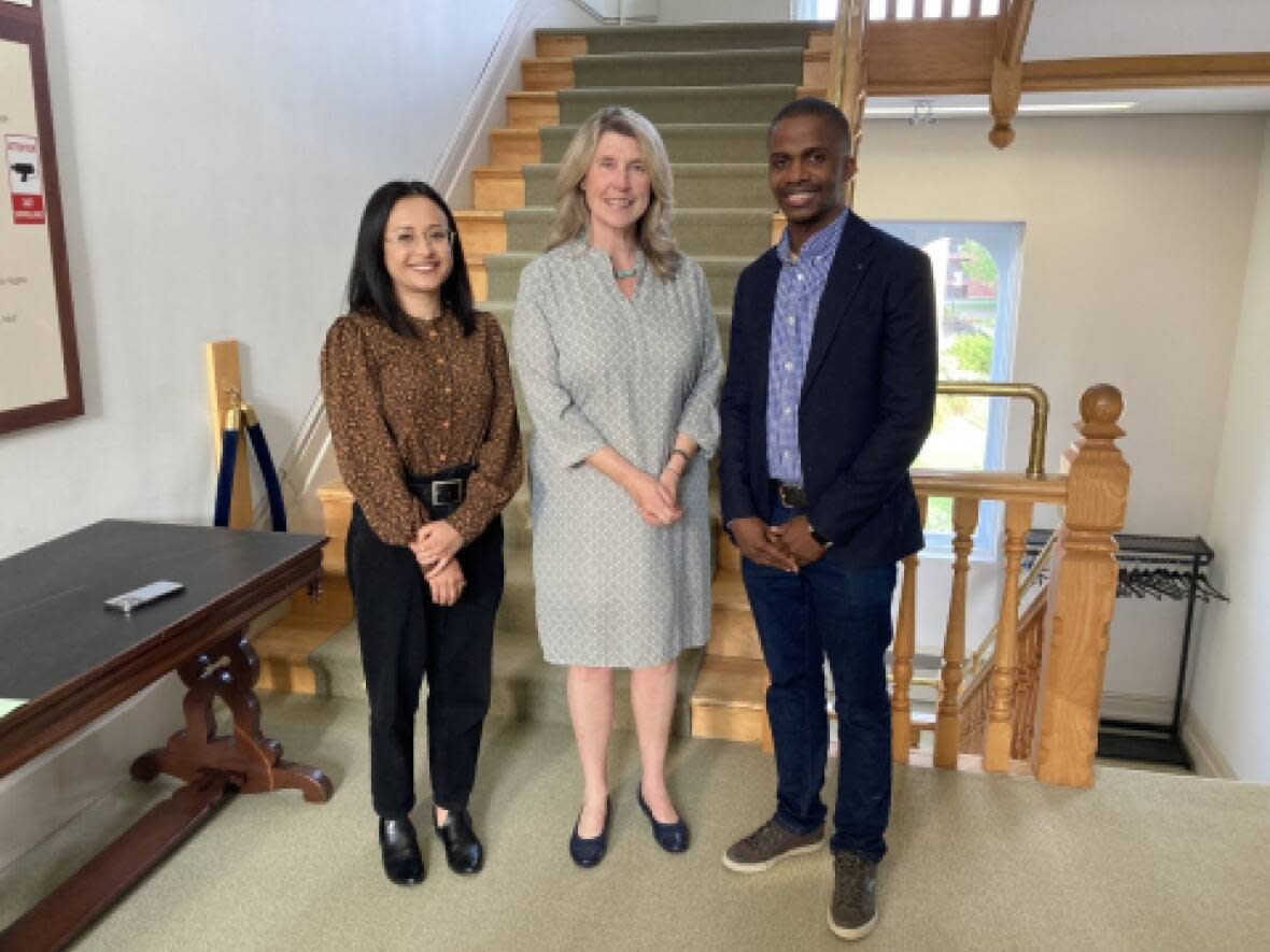 Mayor Kate Rogers is pictured here with two members of the city's anti-racism task force, Prashamsa G.C., left, who is task force secretary, and Passionate Ncube, the chair.  (City of Fredericton - image credit)