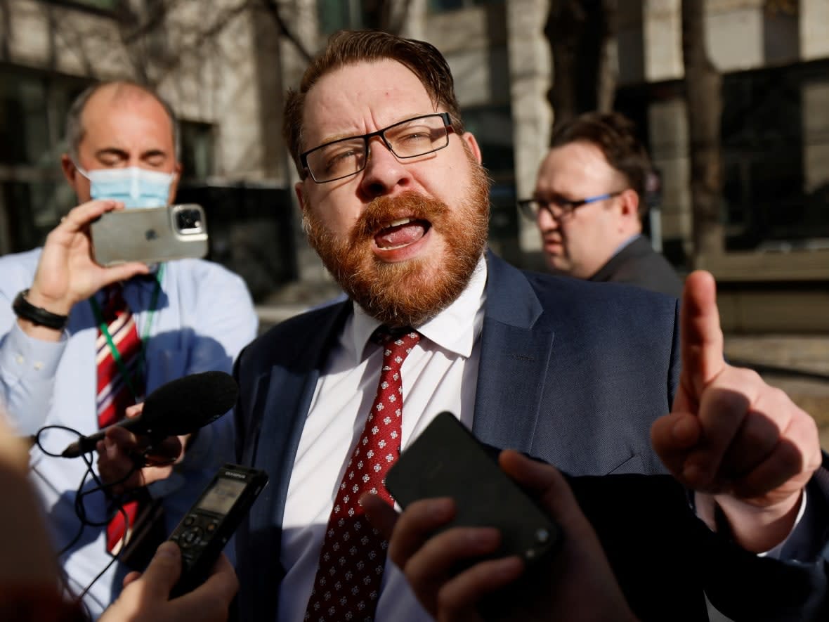 Lawyer Brendan Miller speaks to the media after being kicked out of the Public Order Emergency Commission hearing in Ottawa on Tuesday. (Blair Gable/Reuters - image credit)