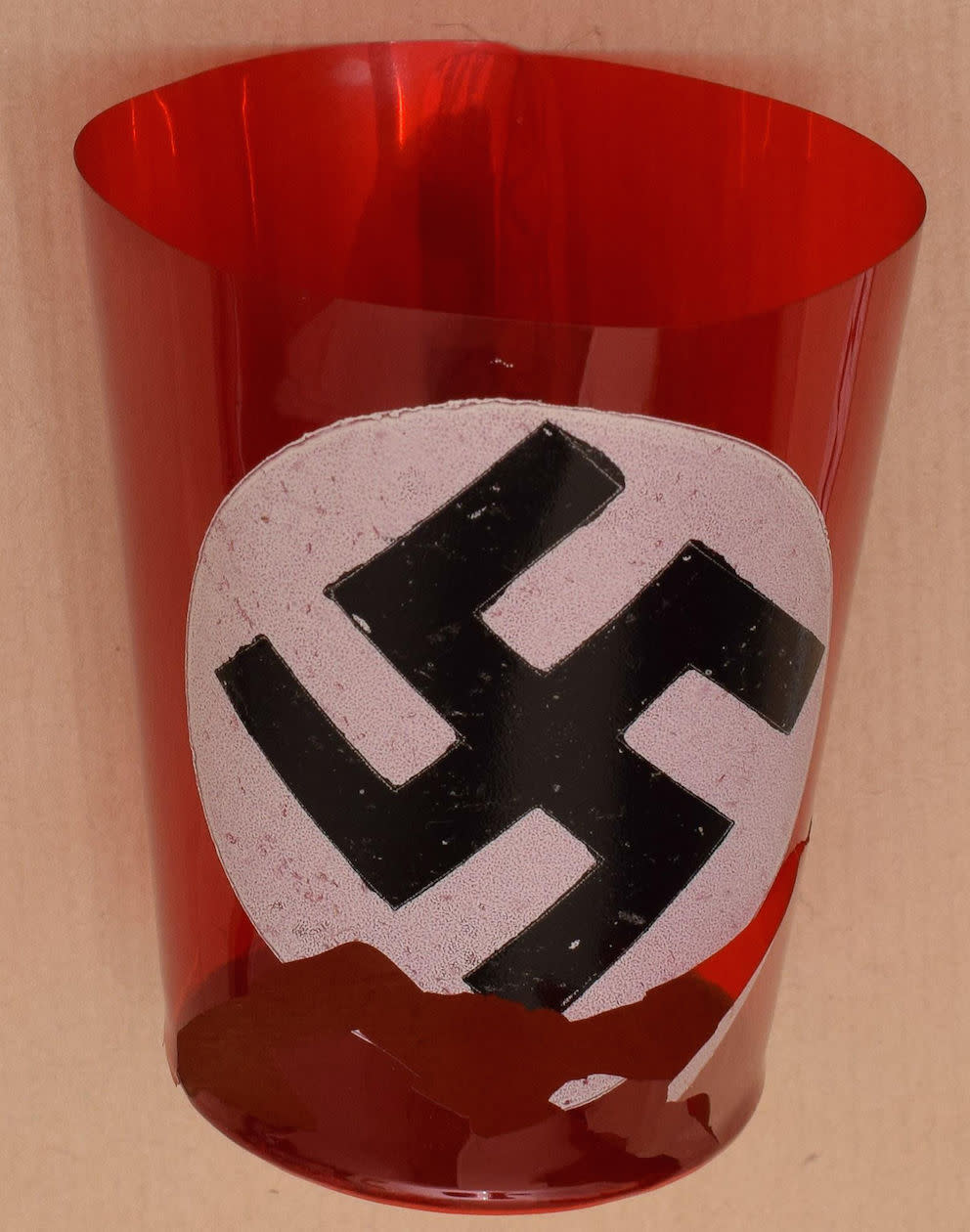 A beaker bearing a Swastika was found on the side board during police searches of the couple’s home in Oxfordshire (Picture: PA)