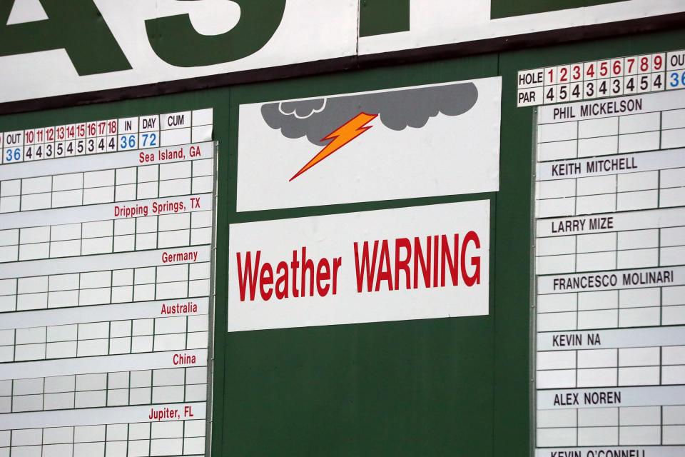 Apr 9, 2019; Augusta, GA, USA; Scoreboard at the first hole under a weather warning with rain and the threat of thunderstorms during a practice round for The Masters golf tournament at Augusta National Golf Club. Mandatory Credit: Rob Schumacher-USA TODAY Sports