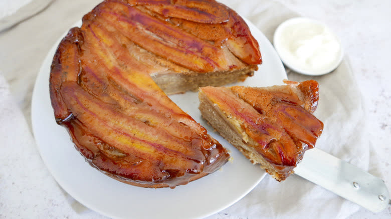 Banana cake with slice removed