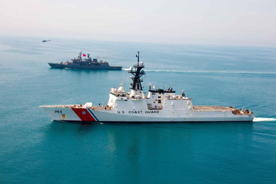 U.S. Coast Guard members conduct boat and flight procedures on the <em>Legend </em>class NSC USCGC <em>Hamilton</em> with Turkish naval members aboard the TCG Turgutries in the Black Sea, April 30, 2021. <em>U.S. Coast Guard </em>