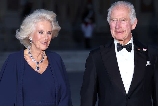 <p>Chris Jackson/Getty</p> Queen Camilla and King Charles attend a state banquet at the Palace of Versailles on September 20 during their state visit to France.