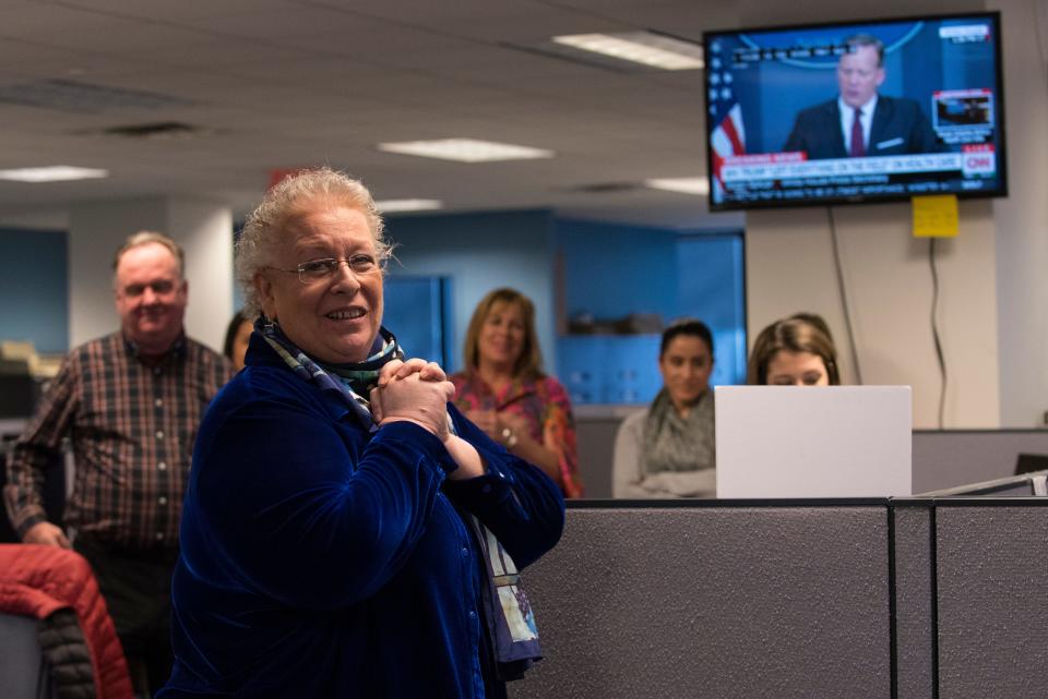 North Jersey Media Group employees gather on Friday, Mar. 24, 2017 to say a fond farewell to Deirdre Sykes, who had been part of the newsroom for 30 years.