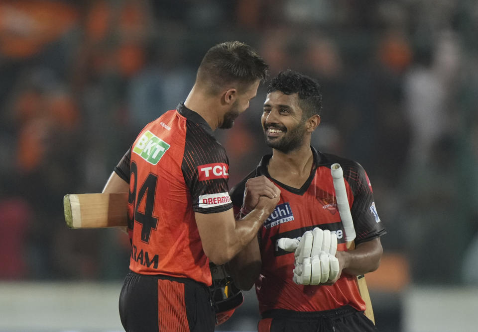 Sunrisers Hyderabad's Rahul Tripathi, with captain Aiden Markram celebrate after wining against Punjab Kings during the Indian Premier League (IPL) match in Hyderabad, India, Sunday, April 9, 2023. (AP Photo/Mahesh Kumar A.)