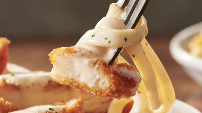 Chicken Alfredo on a fork 