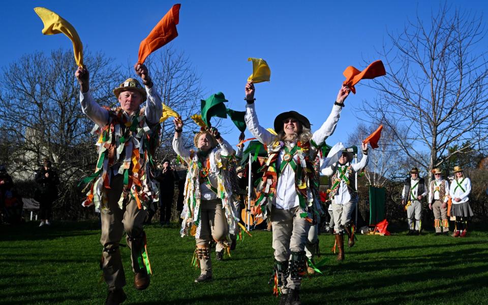 Wyld Morris dancers perform in a traditional wassailing ceremony